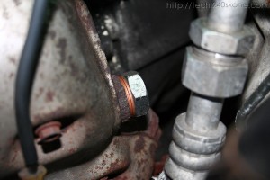 How to remove the Exhaust Gas Recirculation (EGR) Valve from a 240SX KA24DE Exhaust Plug